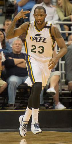 Rick Egan  |  The Salt Lake Tribune

Utah Jazz forward Chris Johnson (23) reacts after hitting a 3-point shot, in NBA action in the final home game of the season at EnergySolutions Arena, Salt Lake City, Monday, April 13, 2015.