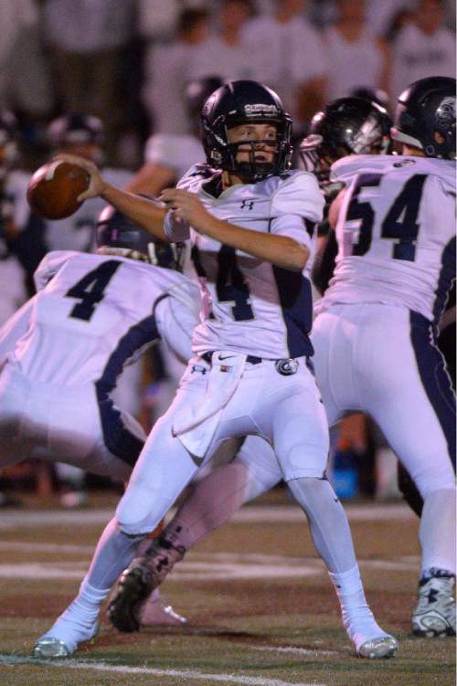 Leah Hogsten  |  The Salt Lake Tribune
Corner Canyon's quarterback Zach Wilson. 
Alta High School football team leads Corner Canyon High School 31-24, Friday, October 23, 2015 at Alta.