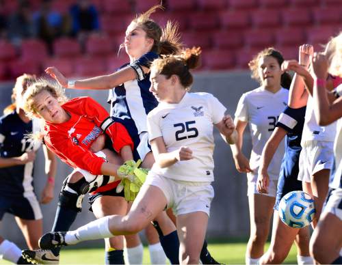 Scott Sommerdorf   |  The Salt Lake Tribune
Timpanogos goalkeeper Carly nelson gets trapped in a tangle of bodies as she blocks a shot during first half play. Skyline beat Timpanogos 3-1 for the girl's 4A soccer title 3-1 played at Rio Tinto stadium, Friday, October 23, 2015.