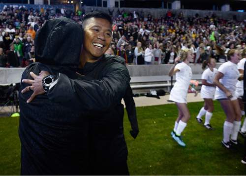 Scott Sommerdorf   |  The Salt Lake Tribune
Davis High head soccer coach Souli Phongsavath celebrates the win as the final seconds tick down. Davis beat Weber 1-0 for the girl's 5A title at Rio Tinto stadium, Friday, October 23, 2015.