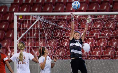 Scott Sommerdorf   |  The Salt Lake Tribune
Davis goalkeeper Kendyl Baker keeps her shutout intact as she directs a shot over the crossbar during second half play. Davis beat Weber 1-0 for the girl's 5A title at Rio Tinto stadium, Friday, October 23, 2015.