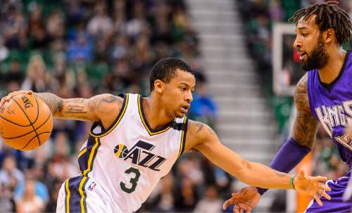 Trent Nelson  |  The Salt Lake Tribune
Utah Jazz guard Trey Burke (3) drives on Sacramento Kings forward Derrick Williams (13) as the Utah Jazz host the Sacramento Kings at EnergySolutions Arena in Salt Lake City, Wednesday April 8, 2015.