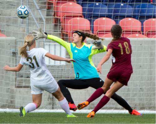 Rick Egan  |  The Salt Lake Tribune

Cedar City's Morgan Myers kicks the ball past Logan Grizzlies goal keeper, for a goal, in the 3A girls soccer state title game at Rio Tinto Stadium, Saturday, October 24, 2015.