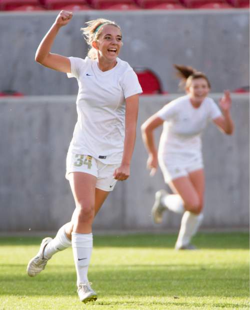 Rick Egan  |  The Salt Lake Tribune

The Logan Grizzlies Kennedy Michel celebrates after scoring a goal, making the score 2-0 for Logan, in their 3-1 win over the Cedar Redmen, in the 3A girls soccer state title game at Rio Tinto Stadium, Saturday, October 24, 2015.