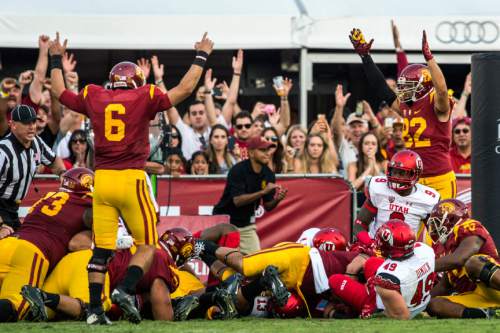 Chris Detrick  |  The Salt Lake Tribune
USC Trojans celebrate their touchdown during the game at the Los Angeles Memorial Coliseum Saturday October 24, 2015.