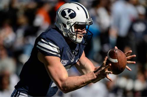Trent Nelson  |  The Salt Lake Tribune
Brigham Young Cougars quarterback Beau Hoge (7) takes a snap as BYU hosts Wagner, NCAA football at LaVell Edwards Stadium in Provo, Saturday October 24, 2015.