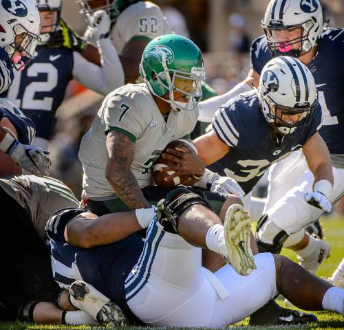 Trent Nelson  |  The Salt Lake Tribune
Wagner Seahawks quarterback Chris Andrews (7) is sacked as BYU hosts Wagner, NCAA football at LaVell Edwards Stadium in Provo, Saturday October 24, 2015.