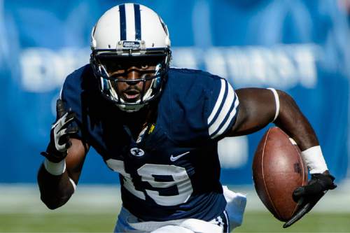 Trent Nelson  |  The Salt Lake Tribune
Brigham Young Cougars wide receiver Devon Blackmon (19) runs the ball as BYU hosts Wagner, NCAA football at LaVell Edwards Stadium in Provo, Saturday October 24, 2015.