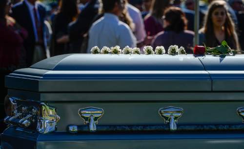 Francisco Kjolseth | The Salt Lake Tribune
Brig. Gen. Roland Wright, who piloted the "Mormon Mustang" in World War II, is laid to rest at Wasatch Lawn Memorial Park in Salt Lake City on Monday, Oct. 26, 2015. Three P-51s, including a replica of his plane, along with a Utah Air National Guard tanker aircraft fly over the cemetery in Wright's honor.
