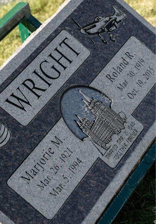 Francisco Kjolseth | The Salt Lake Tribune
Brig. Gen. Roland Wright, who piloted the "Mormon Mustang" in World War II, is laid to rest at Wasatch Lawn Memorial Park in Salt Lake City on Monday, Oct. 26, 2015. Three P-51s, including a replica of his plane, along with a Utah Air National Guard tanker aircraft fly over the cemetery in Wright's honor.