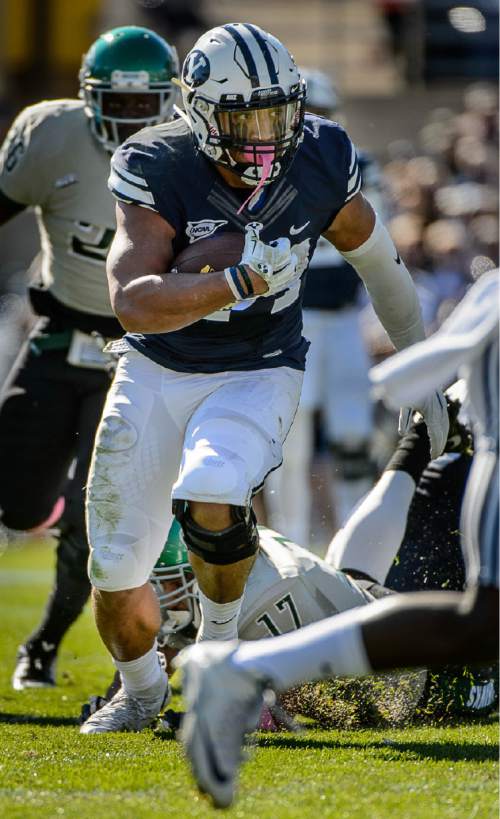 Trent Nelson  |  The Salt Lake Tribune
Brigham Young Cougars running back Algernon Brown (24) runs for a touchdown as BYU hosts Wagner, NCAA football at LaVell Edwards Stadium in Provo, Saturday October 24, 2015.