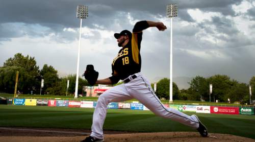 Steve Griffin  |  The Salt Lake Tribune

Bee's starting pitcher Nate Smith starts his warm up process before game against the Las Vegas 51's at Smith's Ballpark in Salt Lake City, Wednesday, August 5, 2015.  l