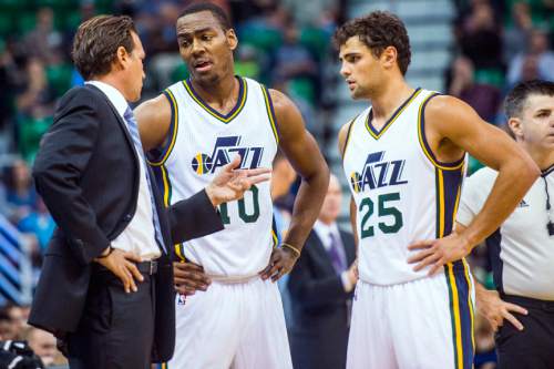 Chris Detrick  |  The Salt Lake Tribune
Utah Jazz head coach Quin Snyder talks with Utah Jazz guard Alec Burks (10) and Utah Jazz guard Raul Neto (25) during the game at EnergySolutions Arena Thursday October 22, 2015.