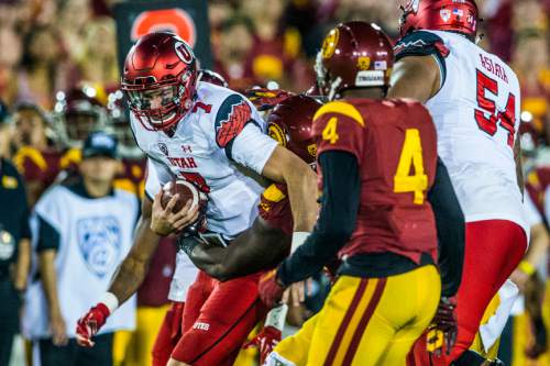 Chris Detrick  |  The Salt Lake Tribune
Utah Utes quarterback Travis Wilson (7) is sacked during the game at the Los Angeles Memorial Coliseum Saturday October 24, 2015.