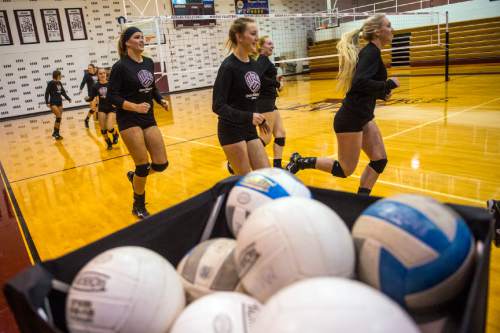 Chris Detrick  |  The Salt Lake Tribune
Members of the volleyball team warm up during a practice at Morgan High School Tuesday October 27, 2015.