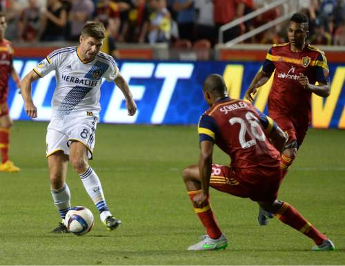 Steve Griffin  |  The Salt Lake Tribune


L.A. Galaxy's  midfielder Steven Gerrard tries to get past Real Salt Lake defender Chris Schuler (28) during second half action in the Real Salt Lake vs. L.A. Galaxy, U.S. Open Cup match at Rio Tinto Stadium in Sandy, Tuesday, July 14, 2015.