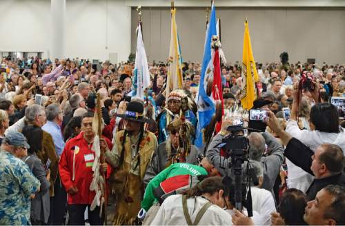 Lennie Mahler  |  The Salt Lake Tribune

Members of the Ute Tribe lead the procession for the opening plenary at the 2015 Parliament of the World's Religions held inside the Salt Palace Convention Center on Thursday, Oct. 15, 2015, in Salt Lake City.