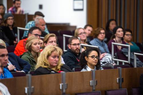 Chris Detrick  |  The Salt Lake Tribune
Audience members listen as Sara Kruzan speaks during Pro Bono Week at the University of Utah S.J. Quinney College of Law Wednesday October 28, 2015. Kruzan was forced into a life of drugs and sexual exploitation and ended up sentenced at age 16 to life in prison without parole. She was eventually freed through the efforts of a group of attorneys working for free, including U. professor Michael Teter.