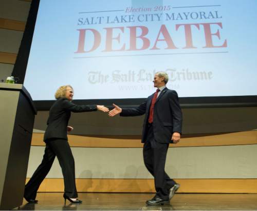 Steve Griffin  |  The Salt Lake Tribune

Jackie Biskupski and Ralph Becker shake hands after a Salt Lake City Mayoral debate at the Main Salt Lake City Library in Salt Lake City, Wednesday, October 28, 2015.