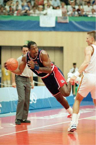 Tribune file photo

USA's Karl Malone looks to pass as he keeps the ball in play during their preliminary basketball game with Germany at the XXV Summer Olympics in Barcelona, Wednesday night, July 29, 1992.