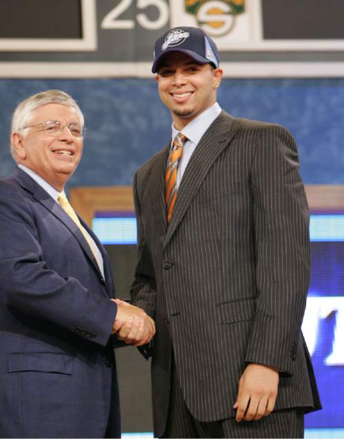 Tribune file photo

Deron Williams, then a guard from Illinois, is congratulated by NBA Commissioner David Stern after he is chosen by the Utah Jazz as the third overall pick of the 2005 NBA Draft Tuesday, June 28, 2005 in New York.