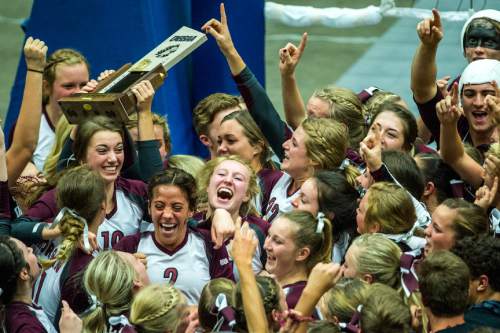Chris Detrick  |  The Salt Lake Tribune
Members of the Morgan volleyball team celebrate after winning the 3A championship match 3-0 against Snow Canyon at the UCCU Center Thursday October 29, 2015.