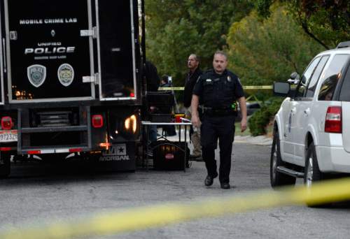 Al Hartmann  |  The Salt Lake Tribune
Scene of early morning double shooting-homicide Thursday Oct. 29 between  a homeowner and assailant in Millcreek area of Salt Lake County.  Unified Police Dept. investigate the crime scene