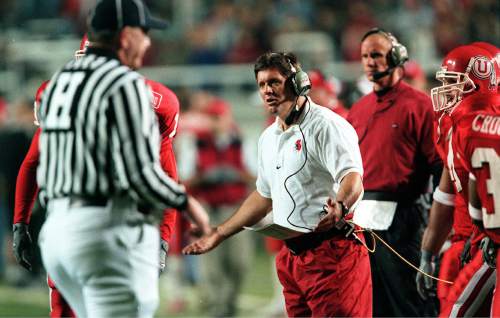 |  Tribune File Photo

Kyle Whittingham, defensive coordinator for the Utes, in his element Saturday night on the sidelines at the Utah-Wyoming football game, November 7, 1999.