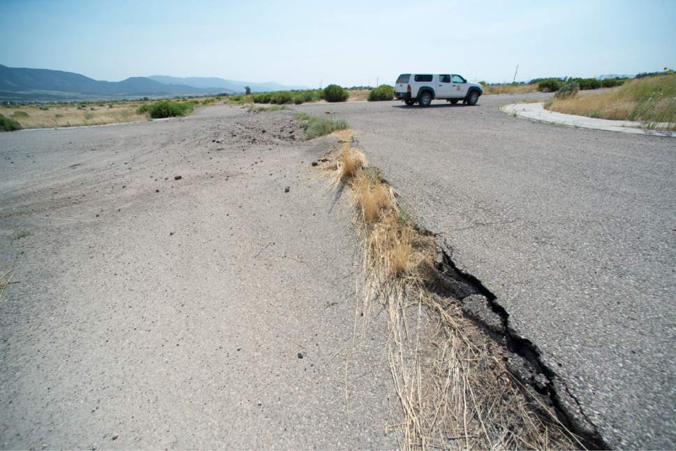 Rick Egan  |  The Salt Lake Tribune

A subdivision near Enoch was halted, because of a fissure that appeared 7 years ago. Thursday, August 20, 2015.