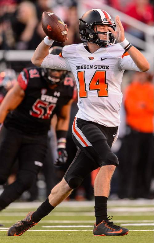 Trent Nelson  |  The Salt Lake Tribune
Oregon State Beavers quarterback Nick Mitchell (14) throws the ball as the University of Utah hosts Oregon State, NCAA football at Rice-Eccles Stadium in Salt Lake City, Saturday October 31, 2015.