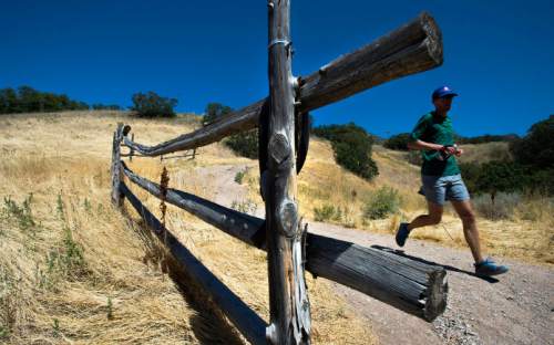 Steve Griffin  |  The Salt Lake Tribune

Chris Jones makes his way along the Bonneville Shoreline Trail near the mouth of Emigration Canyon in Salt Lake City, Monday, Aug. 31, 2015.