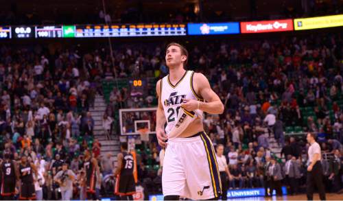 Leah Hogsten  |  The Salt Lake Tribune
Utah Jazz forward Gordon Hayward (20) looks to the stat boards as he leaves the court  after the loss. Utah Jazz fall to the Miami Heat 95-100 at Energy Solutions Arena, Friday, December 12, 2014.