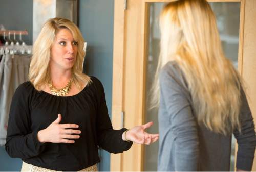 Rick Egan  |  The Salt Lake Tribune

Ann Marie Wallace (left)  gives some advice to  to Abbey Daw (right), owner of Sweat & Soul Yoga, Thursday, October 29, 2015. Ann Marie Wallace coaches women entrepreneurs on how to start and grow their businesses.