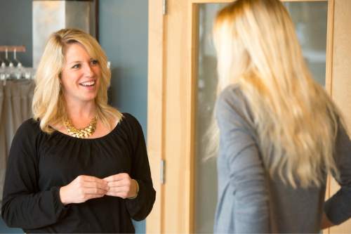 Rick Egan  |  The Salt Lake Tribune

Ann Marie Wallace (left)  gives some advice to  to Abbey Daw (right), owner of Sweat & Soul Yoga, Thursday, October 29, 2015. Ann Marie Wallace coaches women entrepreneurs on how to start and grow their businesses.