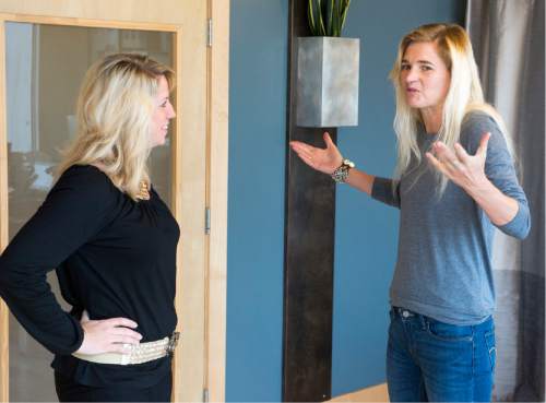 Rick Egan  |  The Salt Lake Tribune

Ann Marie Wallace (left)  gives some advice to  to Abbey Daw (right), owner of Sweat & Soul Yoga, Thursday, October 29, 2015. Ann Marie Wallace coaches women entrepreneurs on how to start and grow their businesses.