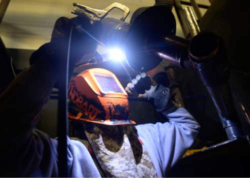 Al Hartmann  |  The Salt Lake Tribune
Jace Johnson, who is close to finishing a welding certification at Mountainland Applied Technology College in Orem practices welding pipe at a 45 degree angle Tuesday Nov. 3.   According to a legislative audit, Utah College of Applied Technology has changed its reporting of student certification in response to a desire for more certificates, outlined in Utahís ì66% by 2020î goal.
