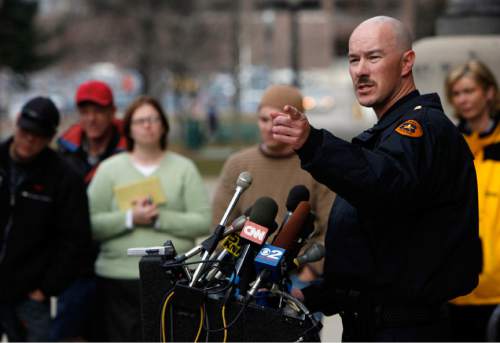 Francisco Kjolseth  |  The Salt Lake Tribune

Salt Lake City police department Chief of Police, Chris Burbank answers questions from the media during a press conference outside of the City County Building the day after the deadly shootings at Trolley Square.