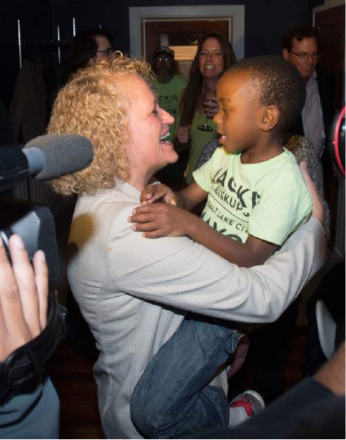 Steve Griffin  |  The Salt Lake Tribune

Jackie Biskupski's hugs her son Archie after seeing election results for the first time at her election night gathering at Kimi's Chop House in Salt Lake City, Tuesday, November 3, 2015.
