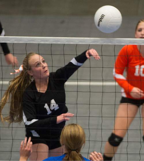 Rick Egan  |  The Salt Lake Tribune

Monticello Buckaroos Allie Maughan (14) knocks the ball over the net, in prep 1A championship volleyball action Panguitch vs. Monticello, at Utah Valley University, Saturday, October 31, 2015.