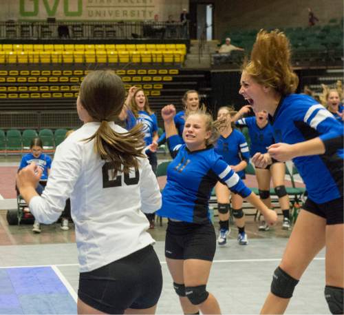 Rick Egan  |  The Salt Lake Tribune

Panguitch celebrates their State Championship win over Monticello, in prep 1A volleyball championship at Utah Valley University, Saturday, October 31, 2015.