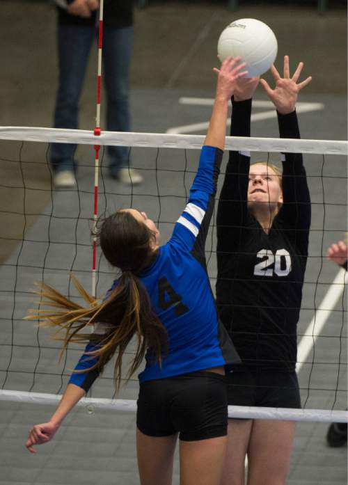 Rick Egan  |  The Salt Lake Tribune

Panguitch Bobcats Whittni Orton (4),hits the ball, as Monticello Buckaroos Marci McDougall (20),defends,  in prep 1A championship volleyball action Panguitch vs. Monticello, at Utah Valley University, Saturday, October 31, 2015.