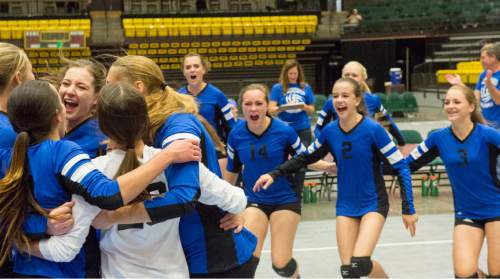 Rick Egan  |  The Salt Lake Tribune

Panguitch celebrates their State Championship win over Monticello, in prep 1A volleyball championship at Utah Valley University, Saturday, October 31, 2015.