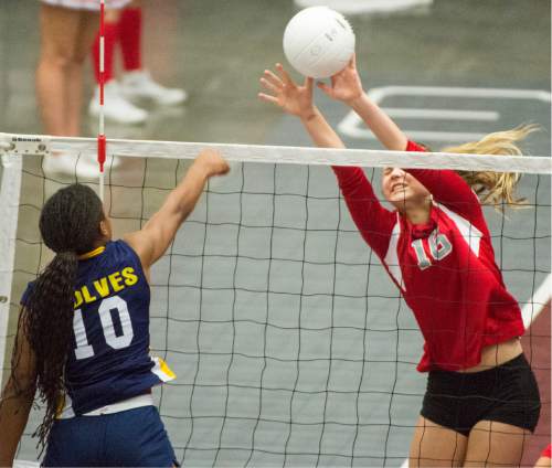 Rick Egan  |  The Salt Lake Tribune

Enterprise Wolves Jaslyn Gardner (10)  hits the ball as The Delta Rabbits Delta Rabbits Rylie Church (16) defends, in the prep 2A State Volleyball Championship game at Utah Valley University, Saturday, October 31, 2015.