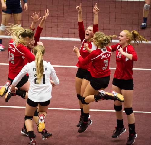 Rick Egan  |  The Salt Lake Tribune

The Delta Rabbits celebrate as they win set  one over the Enterprise Wolves, in the prep 2A State Volleyball Championship game at Utah Valley University, Saturday, October 31, 2015.