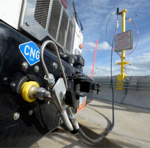 Al Hartmann  |  The Salt Lake Tribune
Sanitation truck fills up at Salt Lake County Fleet Management's new CNG (compressed natural gas) filling station Tuesday Nov. 3.  The new CNG filling stations will service its large fleet of trucks that are switiching from diesel to the cleaner, cheaper charged natural gas. The change to this fuel is expected to reduce the fleet's contribution to  air pollution in the Salt Lake Valley -- just as residents brace for on the onset of inversion season.