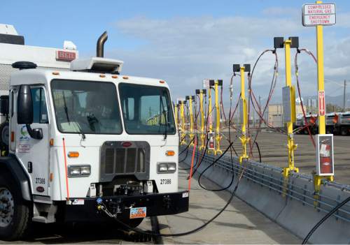 Al Hartmann  |  The Salt Lake Tribune
Sanitation truck fills up at Salt Lake County Fleet Management's new CNG (compressed natural gas) filling station Tuesday Nov. 3.  The new CNG filling stations will service its large fleet of trucks that are switiching from diesel to the cleaner, cheaper charged natural gas. The change to this fuel is expected to reduce the fleet's contribution to  air pollution in the Salt Lake Valley -- just as residents brace for on the onset of inversion season.