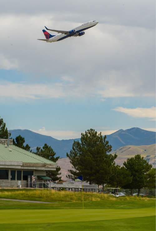 Francisco Kjolseth | The Salt Lake Tribune
Planes take off from Salt Lake International Airport alongside Wingpointe Golf Course that is due to close at the end of this year's golf season. The Salt Lake Department of Airports has determined not to operate or lease the 18-hole course that was built in 1987.