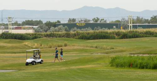 Francisco Kjolseth | The Salt Lake Tribune
Golfers walk the greens at Wingpointe Golf Course that is due to close at the end of this year's golf season. The Salt Lake Department of Airports has determined not to operate or lease the 18-hole course that was built in 1987.