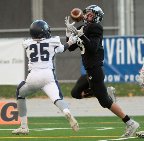 Steve Griffin  |  The Salt Lake Tribune

Highland receiver Ryan Lambson hauls in a long touchdown pass during the Class 4A quarterfinal football game between Corner Canyon and Highland at Highland High School in Salt Lake City, Friday, November 6, 2015.