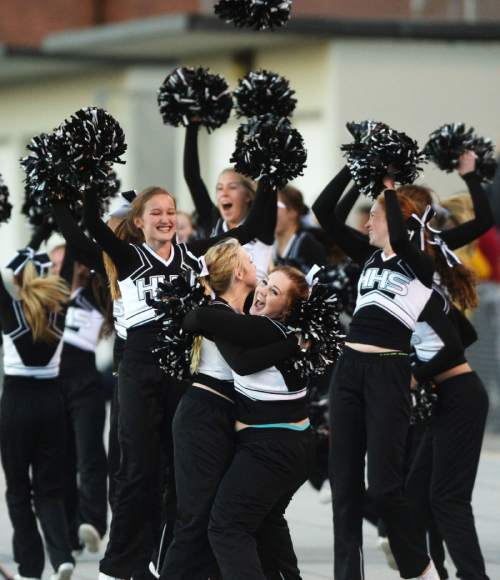 Steve Griffin  |  The Salt Lake Tribune

The Highland cheerleading squad go crazy as the Rams comeback from a 21-points down in the final three minutes of the game to tie Corner Canyon sending the game into overtime during the Class 4A quarterfinal football game between Corner Canyon and Highland at Highland High School in Salt Lake City, Friday, November 6, 2015. Highland went on to win the game in double overtime.